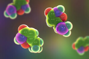 	
3D illustration of colorful molecules, including muscimol, with clustered spheres representing atoms, depicted against a soft, out-of-focus multicolored background.